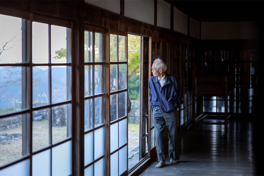 Wooden corridor inside a Japanese temple, symbolizing decline in temple visitors